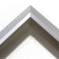 Unique geometric 1 " floater. The face of this molding features an off center peak which gives it a unique contrast in the right lighting.  This frame comes in Metallic Blue Pewter with a dull satin finish.