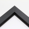 A frame stacker builds a shadow box by layering thinner frames or spacers behind a front frame to create depth. Instead of using one deep moulding, multiple pieces are cut to the same size, joined, and stacked to form a single structure. The glass and artwork sit in the front rabbet, while the stacked spacers extend backward to create space for objects. This method allows flexible depth, clean alignment, and efficient use of standard mouldings.