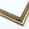 This classic, Victorian-style frame features a solid wood, reverse scoop profile.  The relief-detailed inner lip and sloped face are a textured gold foil, edged in a subtle bevel.

1.25 " width: ideal for small images. Border an acrylic or oil painting or print with this antiqued, high fashion frame.